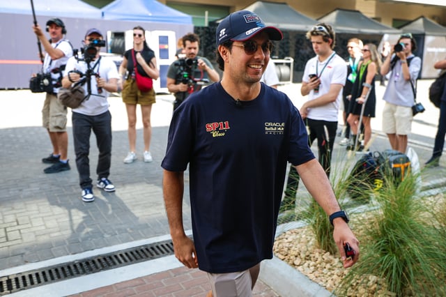 Sergio Perez of Mexico and Oracle Red Bull Racing walks in the paddock during qualifying ahead of the F1 Grand Prix of Abu Dhabi at Yas Marina Circuit on December 7, 2024 in Abu Dhabi, United Arab Emirates.