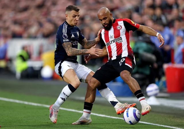 Bryan Mbeumo of Brentford is challenged by Lucas Digne of Aston Villa during the Premier League match between Brentford FC and Aston Villa FC at Brentford Community Stadium on March 08, 2025 in Brentford, England.