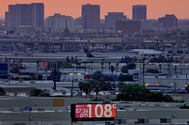 The unofficial temperature hits 108 degrees at dusk at Sky Harbor International Airport in Phoenix, on July 12, 2023.
