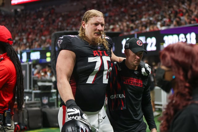 Sep 22, 2024; Atlanta, Georgia, USA; Atlanta Falcons offensive tackle Kaleb McGary (76) leaves the field with an injury against the Kansas City Chiefs in the second quarter at Mercedes-Benz Stadium. Mandatory Credit: Brett Davis-Imagn Images/File Photo