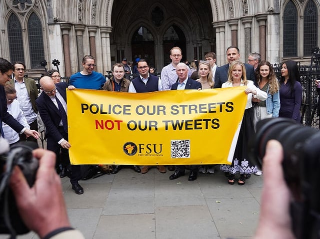 Ray Connolly, supporters and legal team outside the Royal Court of Justice ahead of his wife Lucy Connolly's bid to appeal against her 31 months sentencing on the 15th of May 2025, London, United Kingdom. Lucy Connolly was found guilty of inciting racial hatred after posting a tweet calling for hotels housing asylum seekers to be set on fire and a later tweet calling for mass deportation in July 2024. (photo by Kristian Buus/In Pictures via Getty Images)
