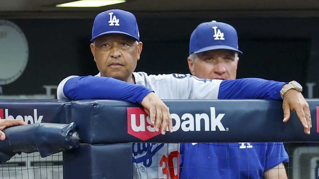 Aug 22, 2025; San Diego, California, USA; Los Angeles Dodgers manager Dave Roberts (30) watches play during the second inning against the San Diego Padres at Petco Park. Mandatory Credit: David Frerker-Imagn Images.
