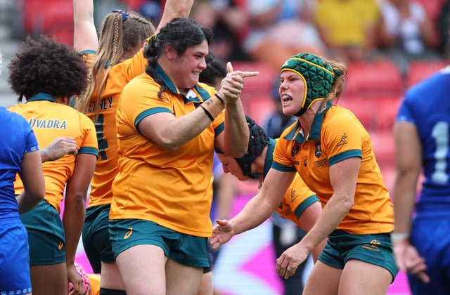 Rugby Union - Women's World Cup 2025 - Pool A - Australia v Samoa - Salford Community Stadium, Salford, Britain - August 23, 2025 Australia's Emily Chancellor celebrates with teammates after Katalina Amosa scores their first try Action Images via Reuters/Craig Brough