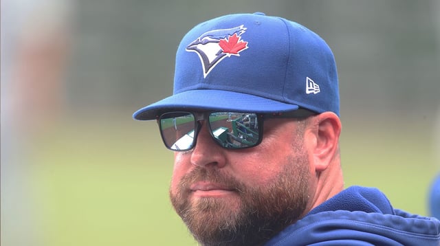 Aug 20, 2025; Pittsburgh, Pennsylvania, USA; Toronto Blue Jays manager John Schneider (14) looks on from the dugout against the Pittsburgh Pirates during the fourth inning at PNC Park. Mandatory Credit: Charles LeClaire-Imagn Images