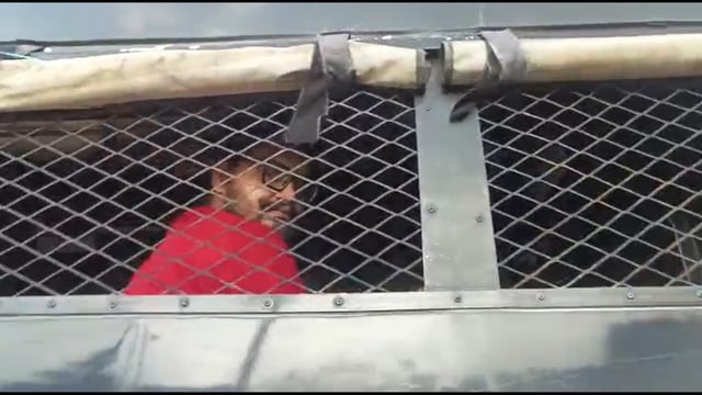 Umar Ansari being brought in a police van to Kasganj District Jail on Saturday. (HT Photo)