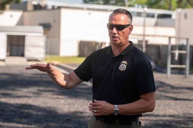 Todd Lyons, acting director of U.S. Immigration and Customs Enforcement (ICE) speaks to the press on the agility course at the Federal Law Enforcement Training Centers (FLETC) in Brunswick, Ga. on Thursday, Aug. 21, 2025.