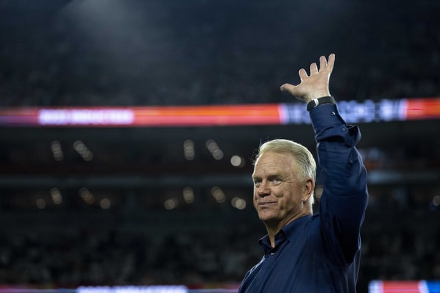 Sep 25, 2023; Cincinnati, Ohio, USA; Boomer Esiason, former Cincinnati Bengals quarterback, waives before being announced at halftime as a Bengals Ring of Champions inductee at halftime of the NFL game between the Cincinnati Bengals and Los Angeles Rams at Paycor Stadium. Mandatory Credit: Albert Cesare-USA TODAY Sports/File Photo