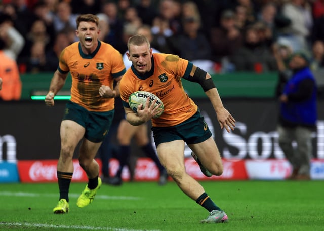 Rugby Union - Rugby Championship - South Africa v Australia - DHL Stadium, Cape Town, South Africa - August 23, 2025  Australia's Max Jorgensen scores a try REUTERS/Esa Alexander
