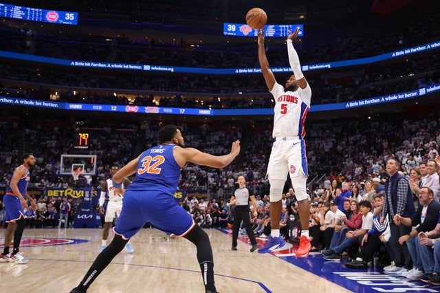 DETROIT, MICHIGAN - APRIL 24: Malik Beasley #5 of the Detroit Pistons shoots the ball against Karl-Anthony Towns #32 of the New York Knicks during the second quarter in Game Three of the Eastern Conference First Round NBA Playoffs at Little Caesars Arena on April 24, 2025 in Detroit, Michigan. NOTE TO USER: User expressly acknowledges and agrees that, by downloading and or using this photograph, User is consenting to the terms and conditions of the Getty Images License Agreement. (Photo by Gregory Shamus/Getty Images)