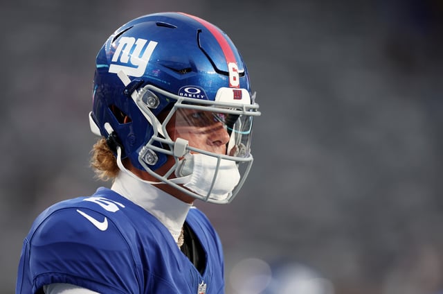 Jaxson Dart #6 of the New York Giants looks on prior to the game against the New England Patriots during the NFL Preseason 2025 game between New England Patriots and New York Giants at MetLife Stadium on August 21, 2025 in East Rutherford, New Jersey.