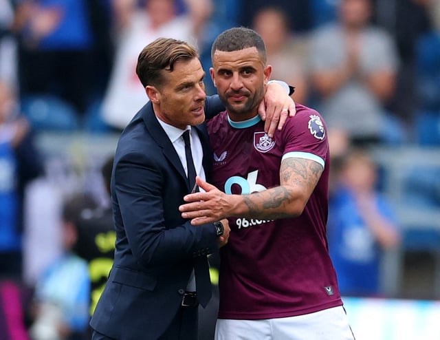 Soccer Football - Premier League - Burnley v Sunderland - Turf Moor, Burnley, Britain - August 23, 2025 Burnley manager Scott Parker and Kyle Walker celebrate after the match Action Images via Reuters/Andrew Boyers