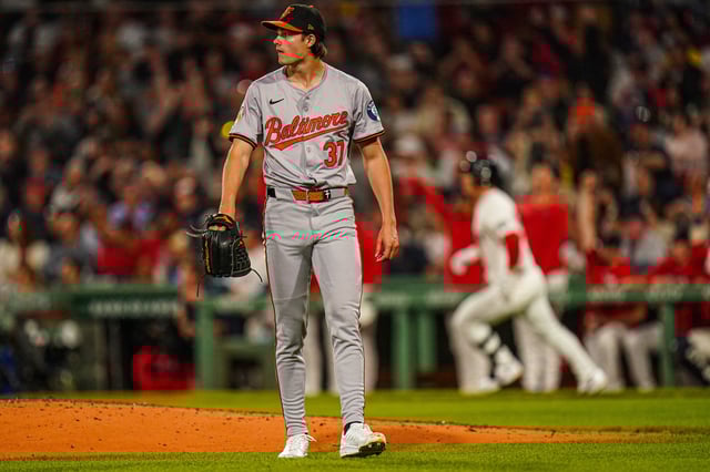 Sep 9, 2024; Boston, Massachusetts, USA; Baltimore Orioles starting pitcher Cade Povich (37) looks on as Boston Red Sox right fielder Rob Refsnyder (30) hits a two run home run in the third inning at Fenway Park. Mandatory Credit: David Butler II-Imagn Images/File photo