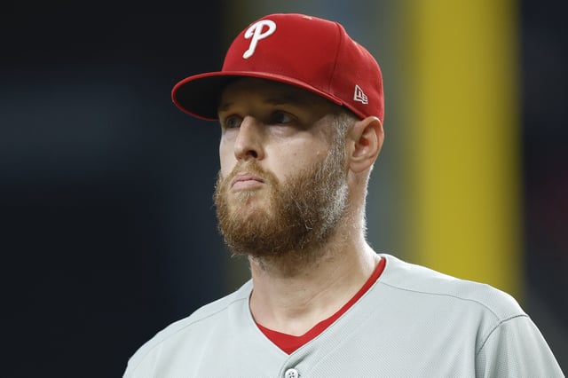 ARLINGTON, TEXAS - AUGUST 10: Zack Wheeler #45 of the Philadelphia Phillies looks on in the first inning during a game against the Texas Rangers at Globe Life Field on August 10, 2025 in Arlington, Texas.