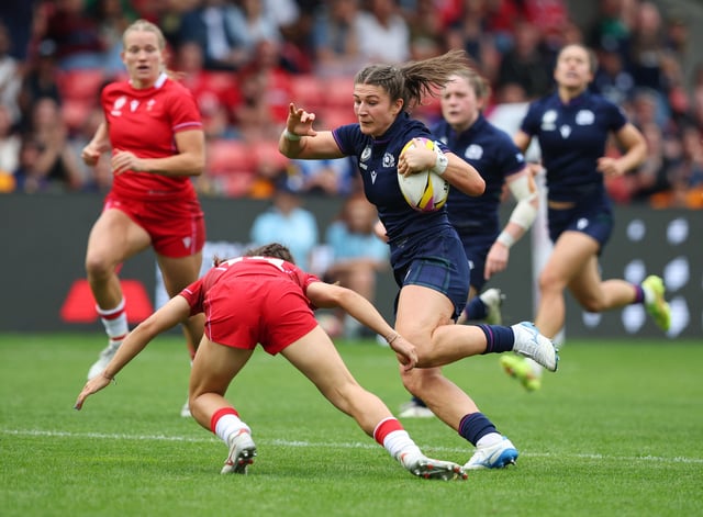 Rugby Union - Women's World Cup 2025 - Pool B - Scotland v Wales - Salford Community Stadium, Salford, Britain - August 23, 2025 Scotland's Helen Nelson in action with Wales' Jasmine Joyce-Butchers Action Images via Reuters/Craig Brough