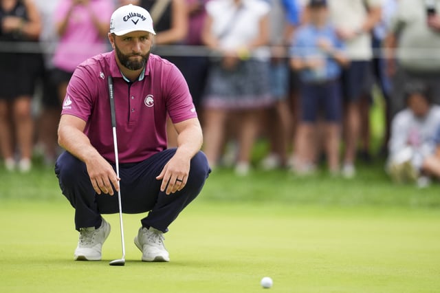 Aug 23, 2025; Detroit, Michigan, USA;  Jon Rahm of Legion XIII lines up a putt on the 17th green during the semifinals of the LIV Golf Michigan Team Championship at The Cardinal at Saint John's Resort. Mandatory Credit: Aaron Doster-Imagn Images