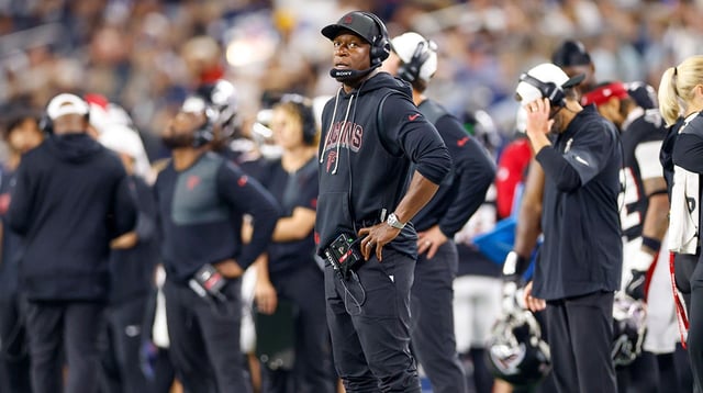 Atlanta Falcons head coach Raheem Morris looks up at scoreboard during the fourth quarter against the Dallas Cowboys at AT&T Stadium. Mandatory Credit: Andrew Dieb-Imagn Images