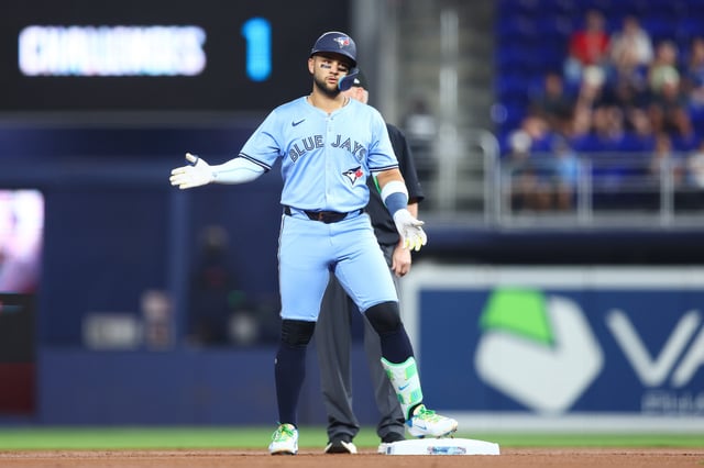 MIAMI, FLORIDA - AUGUST 22: Bo Bichette #11 of the Toronto Blue Jays reacts after hitting a double against the Miami Marlins in the first inning of the game at loanDepot park on August 22, 2025 in Miami, Florida.