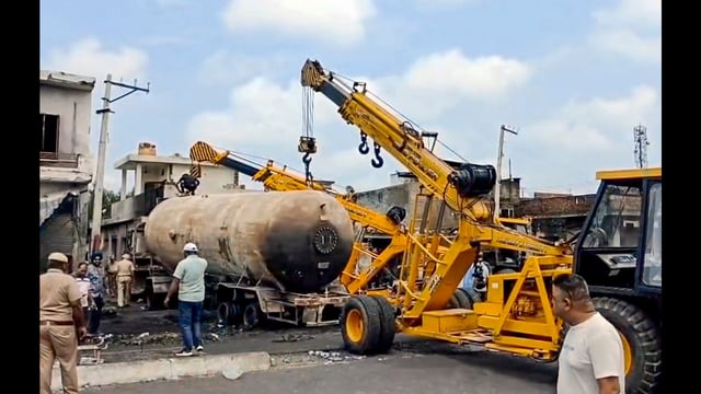 Charred remains of the LPG tanker that caught fire on the Hoshiarpur-Jalandhar road on Friday night. (PTI)