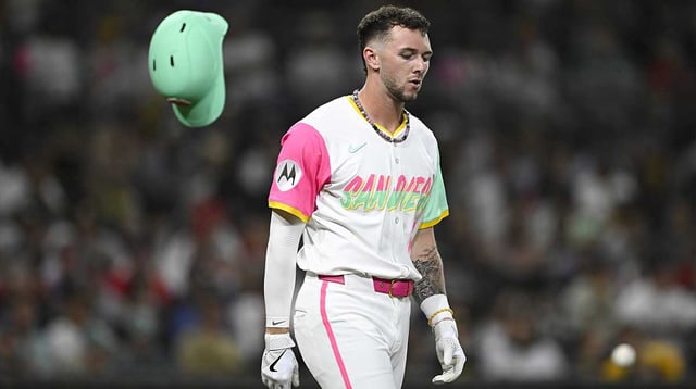 Aug 8, 2025; San Diego, California, USA; San Diego Padres center fielder Jackson Merrill (3) throws his helmet after grounding out during the fifth inning against the Boston Red Sox at Petco Park. Mandatory Credit: Denis Poroy-Imagn Images
