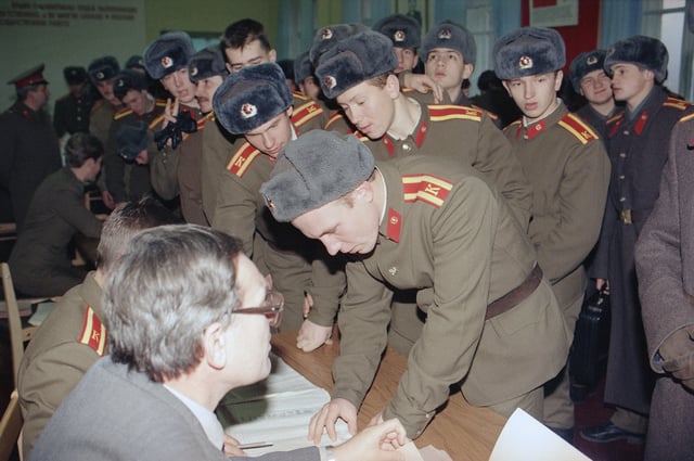 Soviet army cadets register to vote in the Ukraine's first popular presidential election in Kyiv, Dec. 1, 1991. (AP Photo/Liu Heung Shing, File)