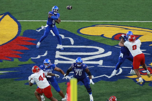 Kansas Jayhawks quarterback Jalon Daniels (6) throws the ball during the game between Fresno State and Kansas at David Booth Kansas Memorial Stadium on Aug. 23, 2025.