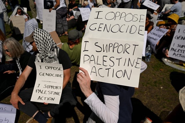 A rally organised by Defend Our Juries, which challenged the Government's proscription of Palestine Action under anti-terrorism laws, in Parliament Square on 9 August (Photo: Jaimi Joy/Reuters)