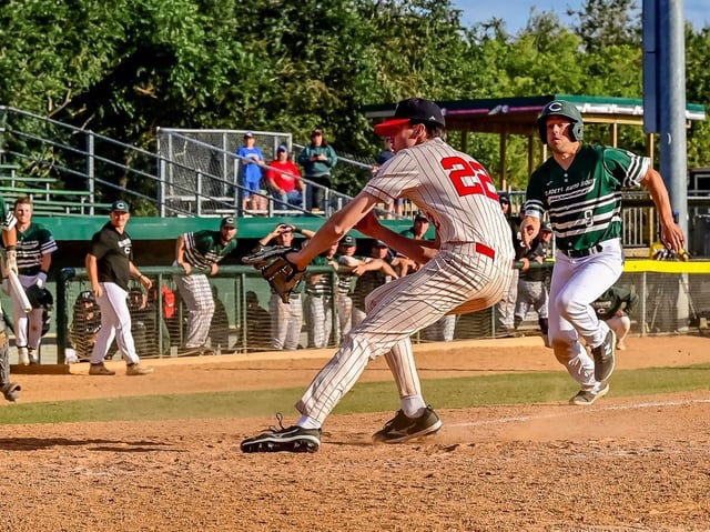 Pinch-runner Jonathan Arsenault, 9, races home to score the game-winning run in the bottom of the seventh inning to lift the Charlottetown Gaudet’s Auto Body Islanders to a 9-8 win over British Columbia on Aug. 23. The win against British Columbia clinched second place in Pool B for the Islanders, who will play for a medal at the 2025 Baseball Canada national senior men’s championship in Regina on Aug. 24.