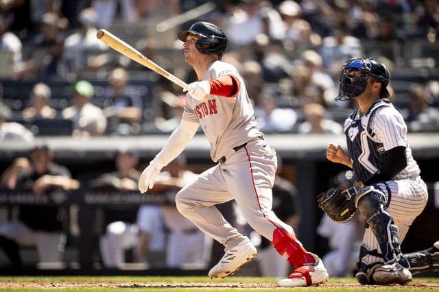 NEW YORK, NY - AUGUST 23: Alex Bregman #2 of the Boston Red Sox hits a sacrifice fly during the fourth inning of a game against the New York Yankees on August 23, 2025 at Yankees Stadium in New York, New York.
