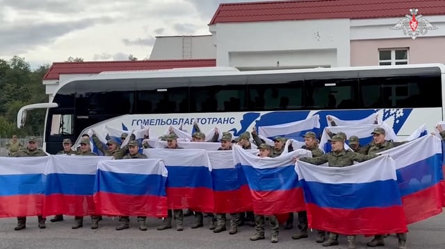 A still image from a video released by the Russian Defence Ministry shows what it said to be Russian service personnel captured by Ukrainian forces and released during the latest exchange of prisoners of war in the course of Russia-Ukraine conflict, at an unknown location in Belarus, in this image taken from footage released August 24, 2025. Russian Defence Ministry/Handout via REUTERS