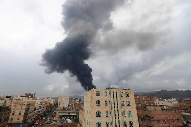 Smoke billows after an Israeli airstrike on Yemen's Houthi-held capital Sanaa on Sunday.