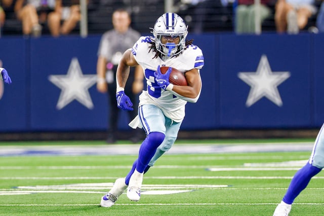 Aug 22, 2025; Arlington, Texas, USA; Dallas Cowboys running back Jaydon Blue (34) carries the ball during the fourth quarter against the Atlanta Falcons at AT&T Stadium. Mandatory Credit: Andrew Dieb-Imagn Images/File Photo
