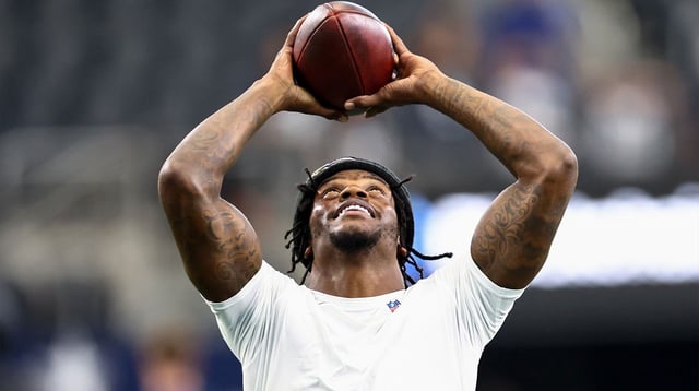 Aug 16, 2025; Arlington, Texas, USA; Baltimore Ravens quarterback Lamar Jackson (8) warms up before the game against the Dallas Cowboys at AT&T Stadium. Mandatory Credit: Kevin Jairaj-Imagn Images