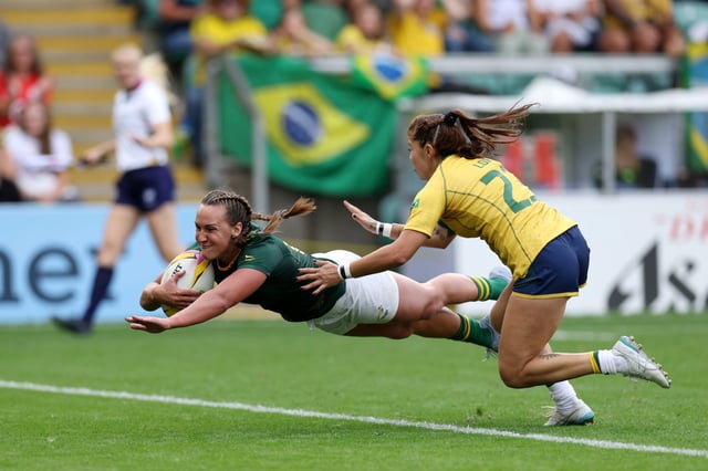 NORTHAMPTON, ENGLAND - AUGUST 24: Libbie Janse van Rensburg of South Africa dives over to score her team's seventh try during the Women's Rugby World Cup 2025 Pool D match between South Africa and Brazil at Franklin's Gardens on August 24, 2025 in Northampton, England. (Photo by David Rogers/Getty Images)