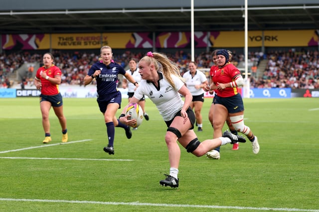 Jorja Miller of New Zealand runs with the ball before scoring her team's first try during the Women's Rugby World Cup 2025. (Photo by Stu Forster/Getty Images)