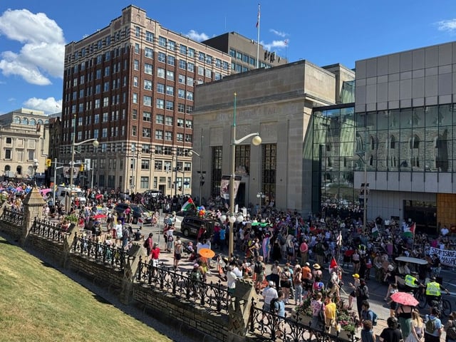 Pride parade participants and Palestinian supporters clash an Wellington Street Sunday