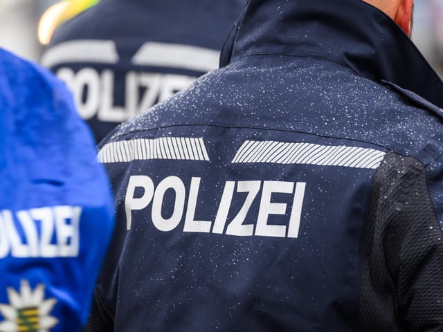 13 November 2024, Saxony, Dresden: A police officer stands on a road during a traffic stop. Photo: Robert Michael/dpa (Photo by Robert Michael/picture alliance via Getty Images)