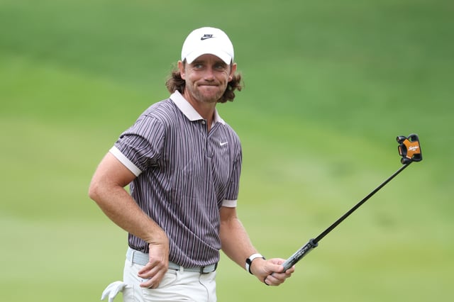 Tommy Fleetwood of England reacts on the 18th green during the third round of the TOUR Championship 2025 at East Lake Golf Club on August 23, 2025 in Atlanta, Georgia.