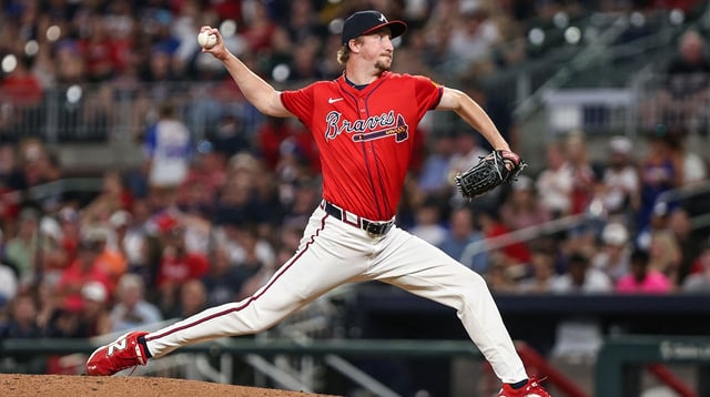 Aug 22, 2025; Cumberland, Georgia, USA; Atlanta Braves pitcher Erick Fedde (22) pitches the ball against the New York Mets during the fifth inning at Truist Park. Mandatory Credit: Jordan Godfree-Imagn Images