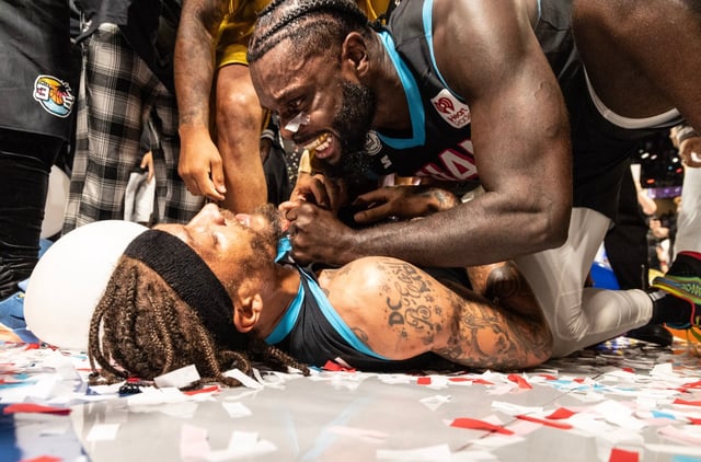Miami 305’s Michael Beasley (11) lies one the floor and celebrates with Lance Stephenson (1) after winning the championship game of the Big3  basketball game in Orlando, Fla., Sunday, Aug. 24, 2025. (Willie J. Allen Jr./Orlando Sentinel)