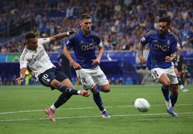 Soccer Football - LaLiga - Real Oviedo v Real Madrid - Estadio Carlos Tartiere, Oviedo, Spain - August 24, 2025 Real Madrid's Kylian Mbappe scores their first goal REUTERS/Pankra Nieto