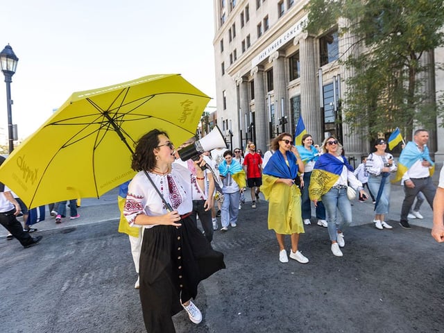  Ukrainians and supporters march along Stephen Avenue following a rally to mark Ukrainian Independence Day at Calgary Municipal Plaza on Sunday, Aug. 24, 2025.