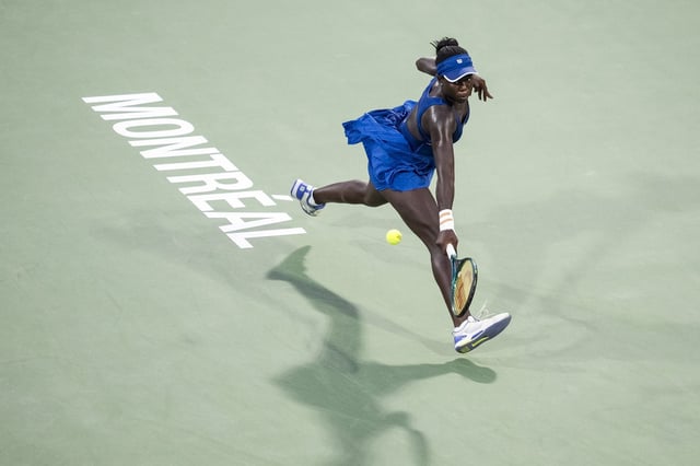 Victoria Mboko of Canada hits a return during finals tennis action against Naomi Osaka of Japan at the National Bank Open in Montreal on Thursday, August 7, 2025.  THE CANADIAN PRESS/Christopher Katsarov
