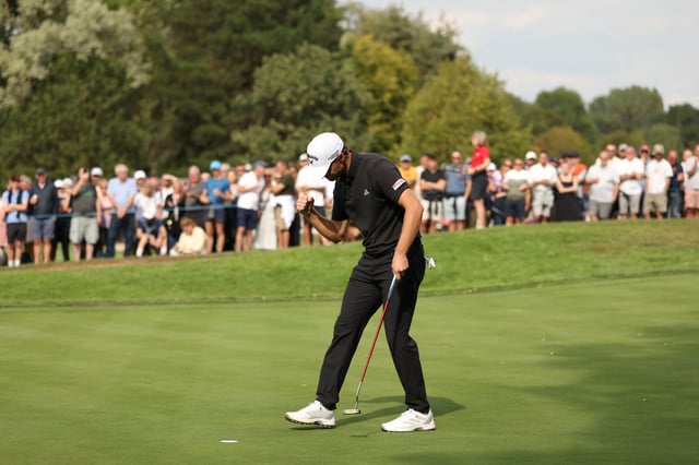 Rasmus Hojgaard of Denmark celebrates on the 18th green following his round and subsequent qualification for the European Ryder Cup team on day four of the Betfred British Masters hosted by Sir Nick Faldo 2025 at The Belfry on August 24, 2025 in Sutton Coldfield, England.