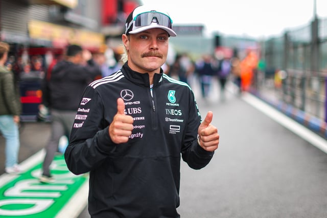 Valtteri Bottas of Finland and Mercedes poses with a thumbs up in the pit lane during the F1 Grand Prix of Belgium at Circuit de Spa-Francorchamps on July 27, 2025 in Spa, Belgium.