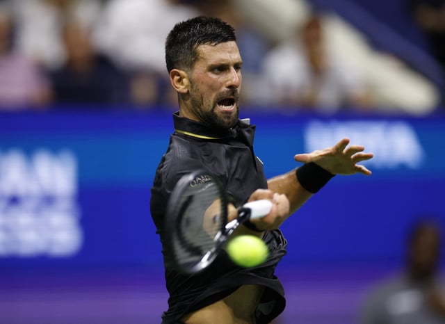 Tennis - U.S. Open - Flushing Meadows, New York, United States - August 24, 2025 Serbia's Novak Djokovic in action during his first round match against Learner Tien of the U.S. REUTERS/Eduardo Munoz