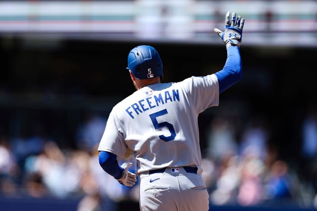 The Dodgers’ Freddie Freeman waves as he runs the bases after hitting the first of his two home runs against Padres on Sunday., Aug. 24, 2025, in San Diego. (AP Photo/Derrick Tuskan)