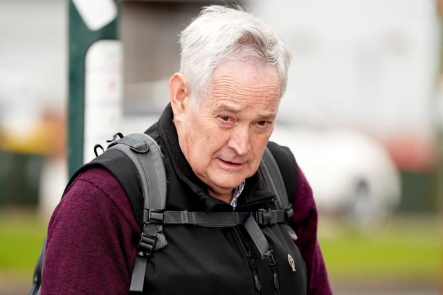 Ian Wilkinson, the sole surviving guest from a fatal lunch served by Erin Patterson who is accused of murdering three of her estranged husband's elderly relatives with a meal laced with poisonous mushrooms, arrives at the Latrobe Valley Law Courts in Morwell, Australia, June 25, 2025. REUTERS/Asanka Brendon Ratnayake/File Photo
