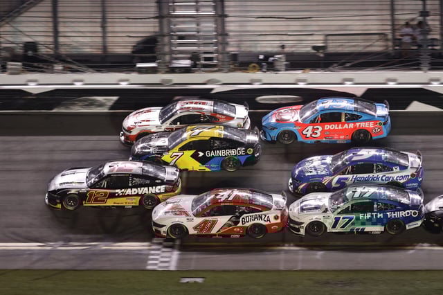 Ryan Blaney, driver of the No. 12 Advance Auto Parts Ford, crosses the start finish line to win the NASCAR Cup Series Coke Zero Sugar 400 at Daytona International Speedway on August 23, 2025 in Daytona Beach, Florida. (Photo by Chris Graythen/Getty Images)