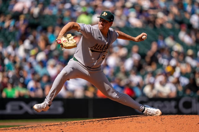 Aug 24, 2025; Seattle, Washington, USA; Athletics starter Jacob Lopez (57) delivers a pitch during the third inning against the Seattle Mariners at T-Mobile Park. Mandatory Credit: Stephen Brashear-Imagn Images