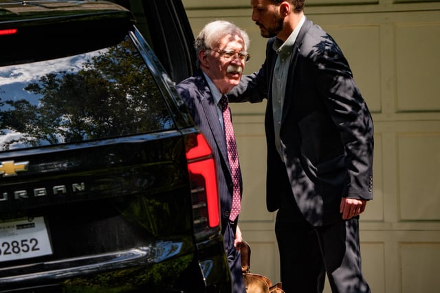John Bolton, former national security adviser to President Trump, arrives home as the FBI searches his house in Bethesda, Maryland, on August 22, 2025. (Photo by Andrew Harnik/Getty Images)